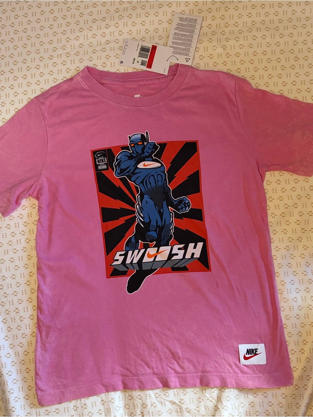 Nike Pink Graphic 'Swoosh' Superhero Tee